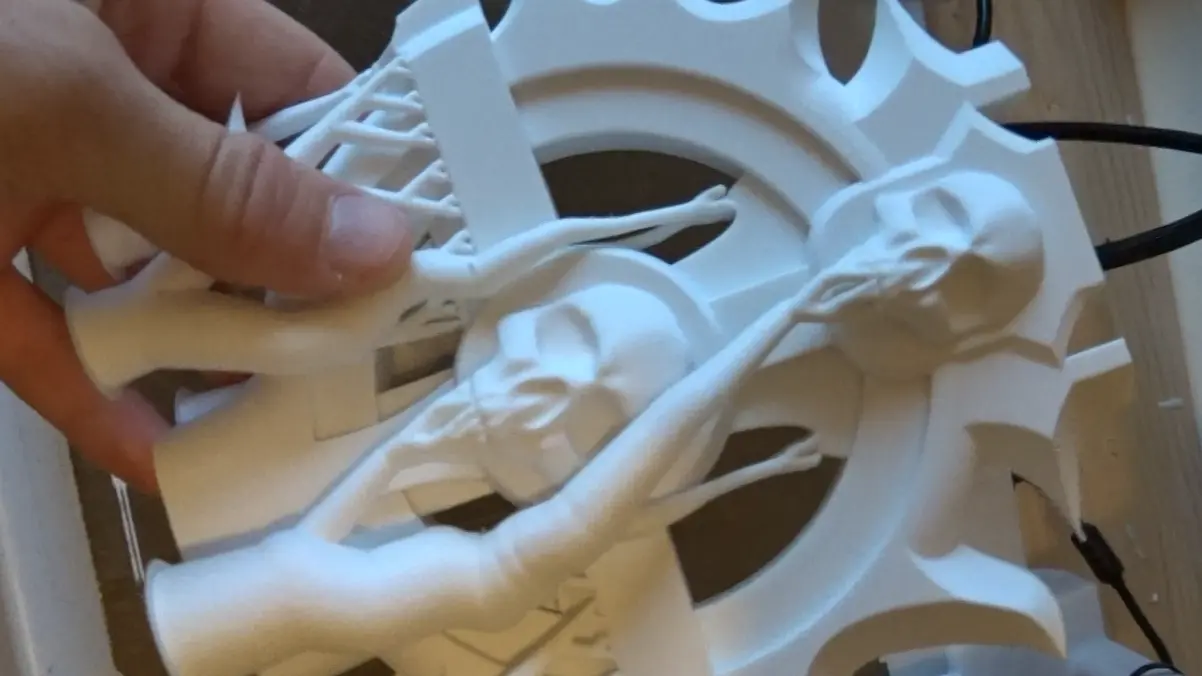 Retrait des supports pour le post traitement